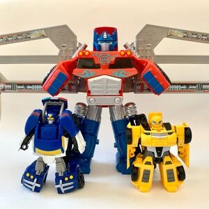 Transformers Rescue Bots Optimus Prime with Trailer, Bumblebee, and Chase Lot
